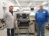 Brian Benda, Corporate Director of Operations, and Garry Deacon, Process Engineer, at NRI Electronics Inc.